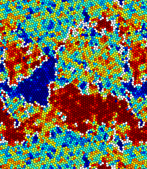 Simulated Assembly of Soft Particles into Crystalline Domains